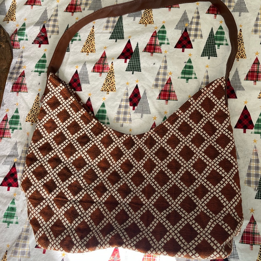 Brown and White Hobo Bag with Geometric Pattern and Curved Handle